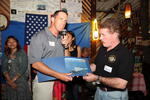 CO presenting signed photo of USS Sterett